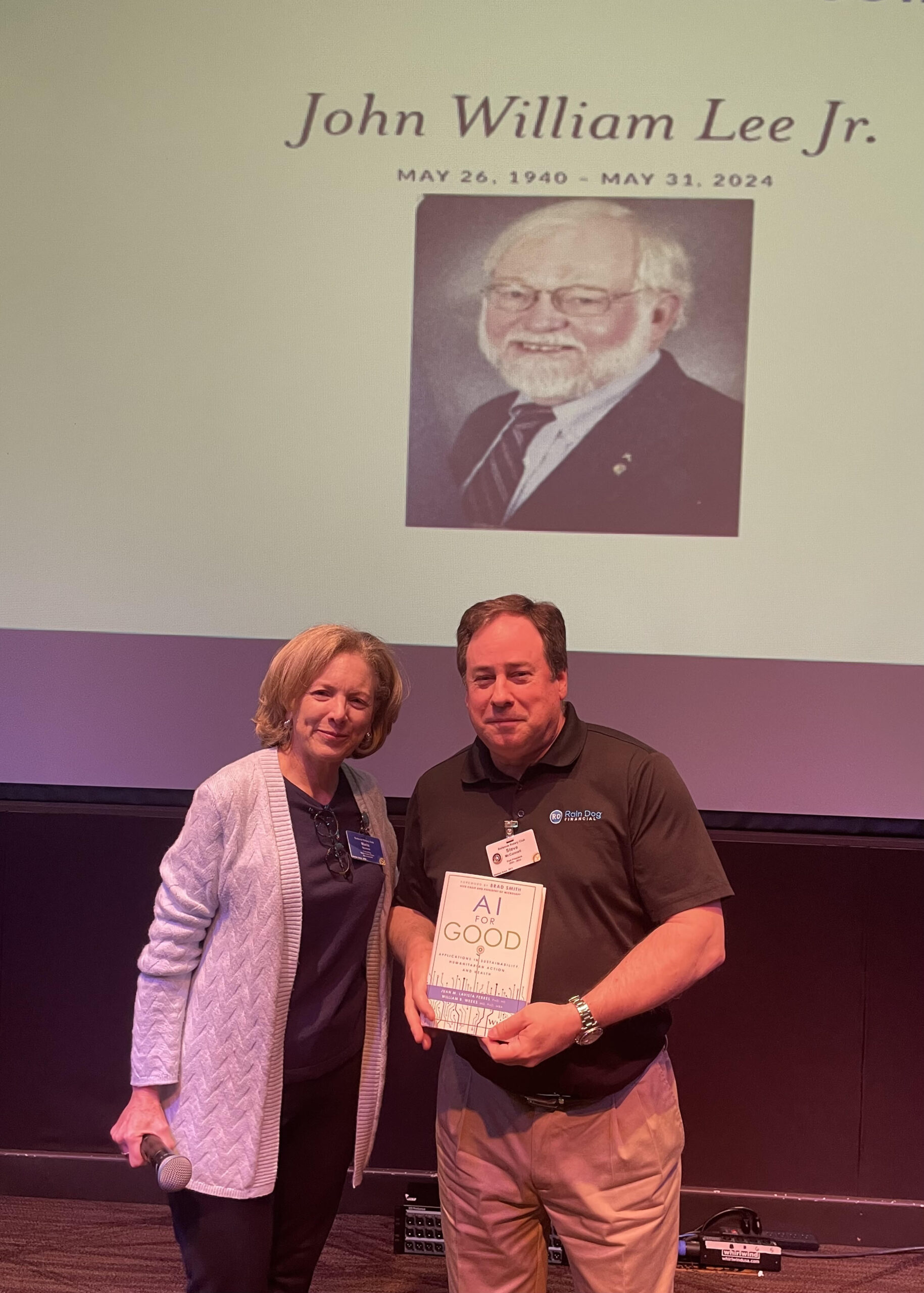 Maria Norena announces the John Lee environmental award to past president Steve McConnell. Maria Norena announces the John Lee environmental award to past president Steve McConnell