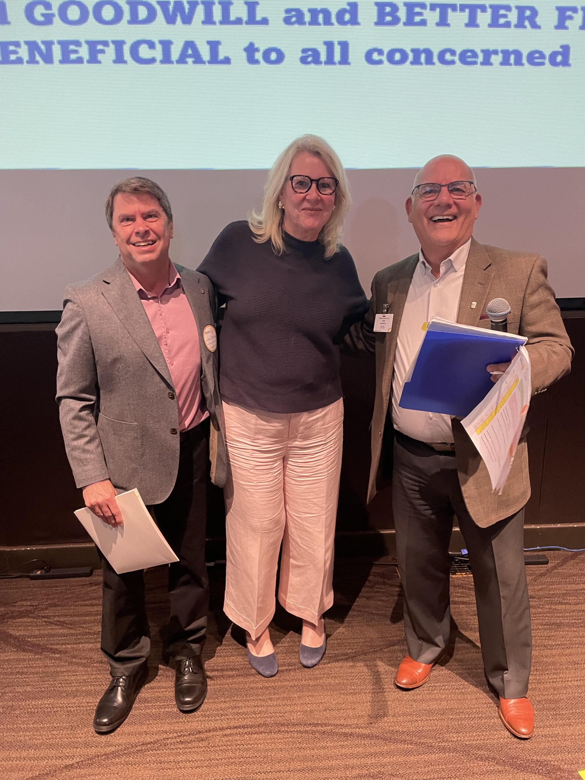 Newest member Jon Browning shares the stage with sponsor Celia Morant and President Tom.