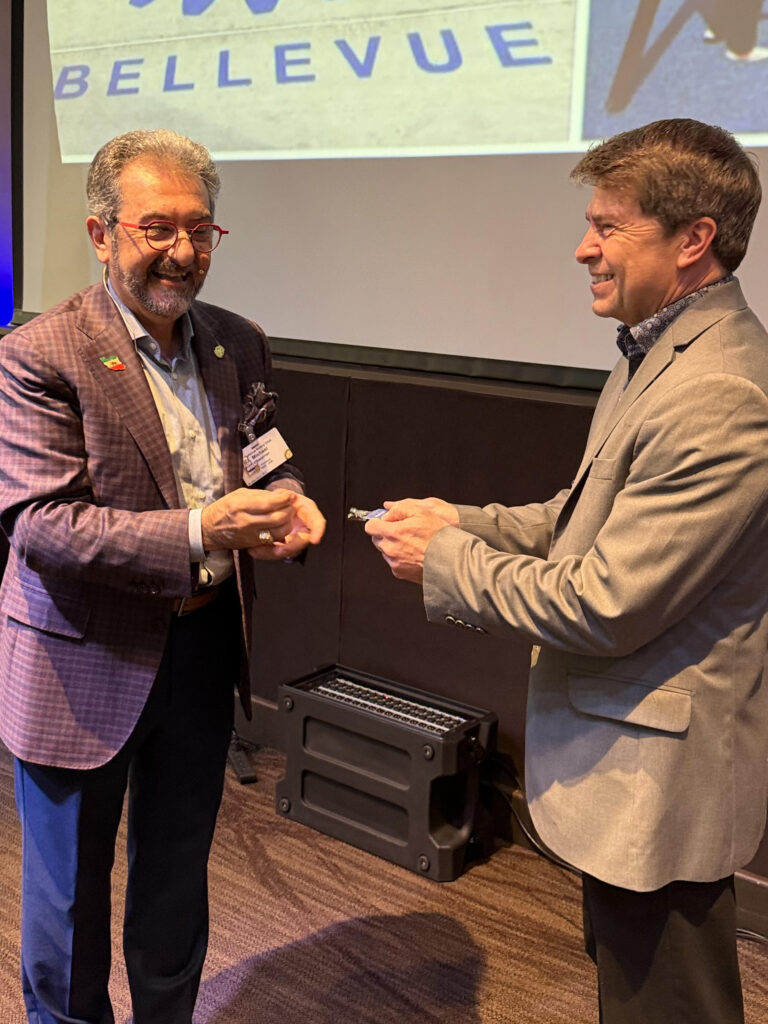 President Michael awarding Jon Browning his new blue badge.